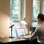 51 Vagas de Emprego na Quality Digital man in white dress shirt sitting on chair using laptop computer