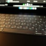 Vagas Remotas na Jetimob, com remuneração de até R$ 4.800,00 (CLT) Close-up of a laptop keyboard with screen blurred