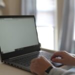 Vagas Remotas na Superlógica person using black and gray laptop computer