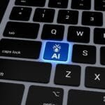 37 milhões de brasileiros podem ser impactados pela IA no trabalho a computer keyboard with a blue light on it