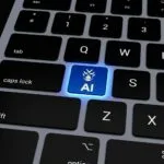 37 milhões de brasileiros podem ser impactados pela IA no trabalho a computer keyboard with a blue light on it